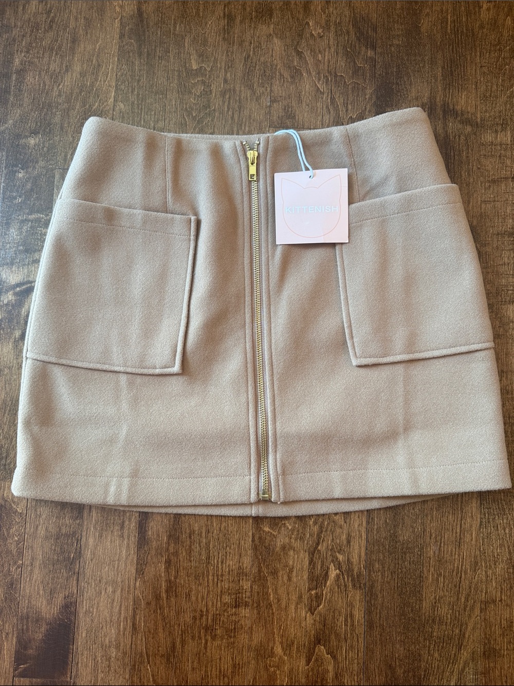 Kittenish Tan Mini Skirt with Front Zip and Patch Pockets
